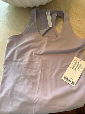 NWT Love Tank by lululemon.
Perfect condition. Color is lavender/light purple.